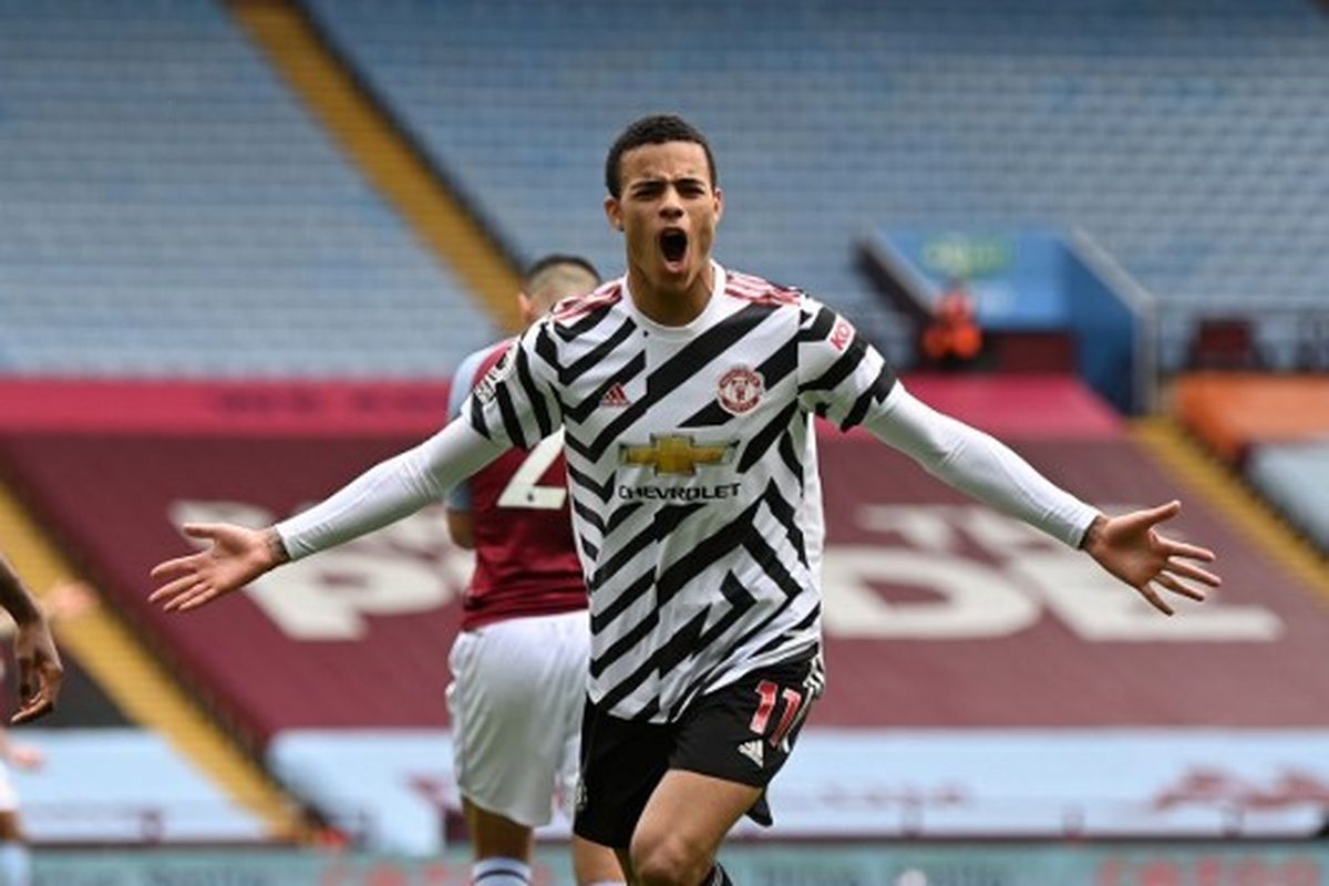 Mason Greenwood merayakan golnya dalam pertandingan Aston Villa vs Man United di Stadion Villa Park, Minggu (9/5/2021). 