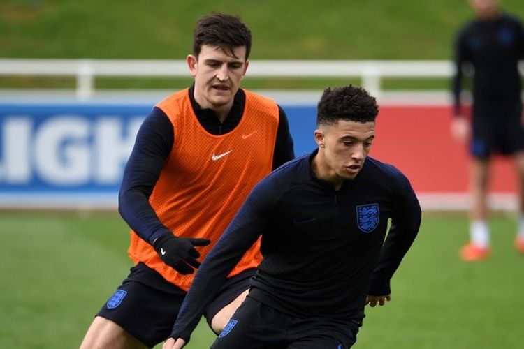 Jadon Sancho dan Harry Maguire berlatih bersama timnas Inggris di St Georges Park, Inggris, pada 19 Maret 2019.