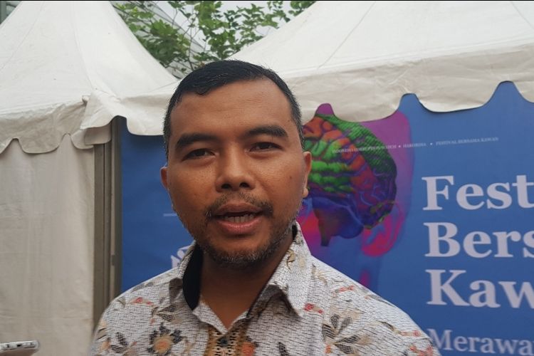 Koordinator ICW Adnan Topan Husodo saat ditemui usai membuka Peringatan Hari Antikorupsi Sedunia 2019 yang digelar ICW di Taman Menteng, Jakarta Pusat, Senin (9/12/2019.)