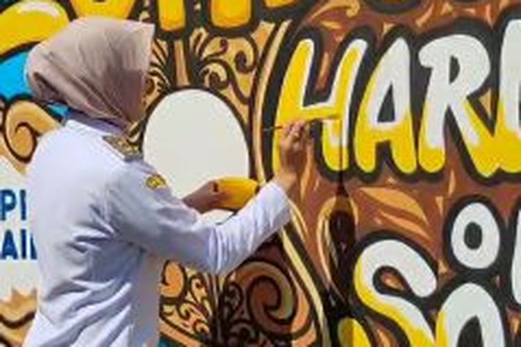 Pasutri asal Bekasi Bersaing Ketat dalam Lomba Mural Sambut Hari Jadi Pemkot Solo di Pagar Tembok Gereja Purbayan
