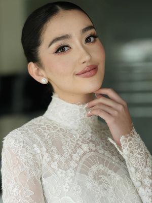 Ranty Maria resmi menikah dengan Rayn Wijaya di Bali, Senin (26/1/2026). Intip penampilannya yang anggun dan klasik