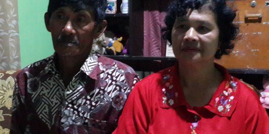 Budi Sutrisno dan Suliasih, orang tua Jafro Megawanto di rumahnya, Kelurahan Songgokerto, Kota Batu, Minggu (26/8/2018)
