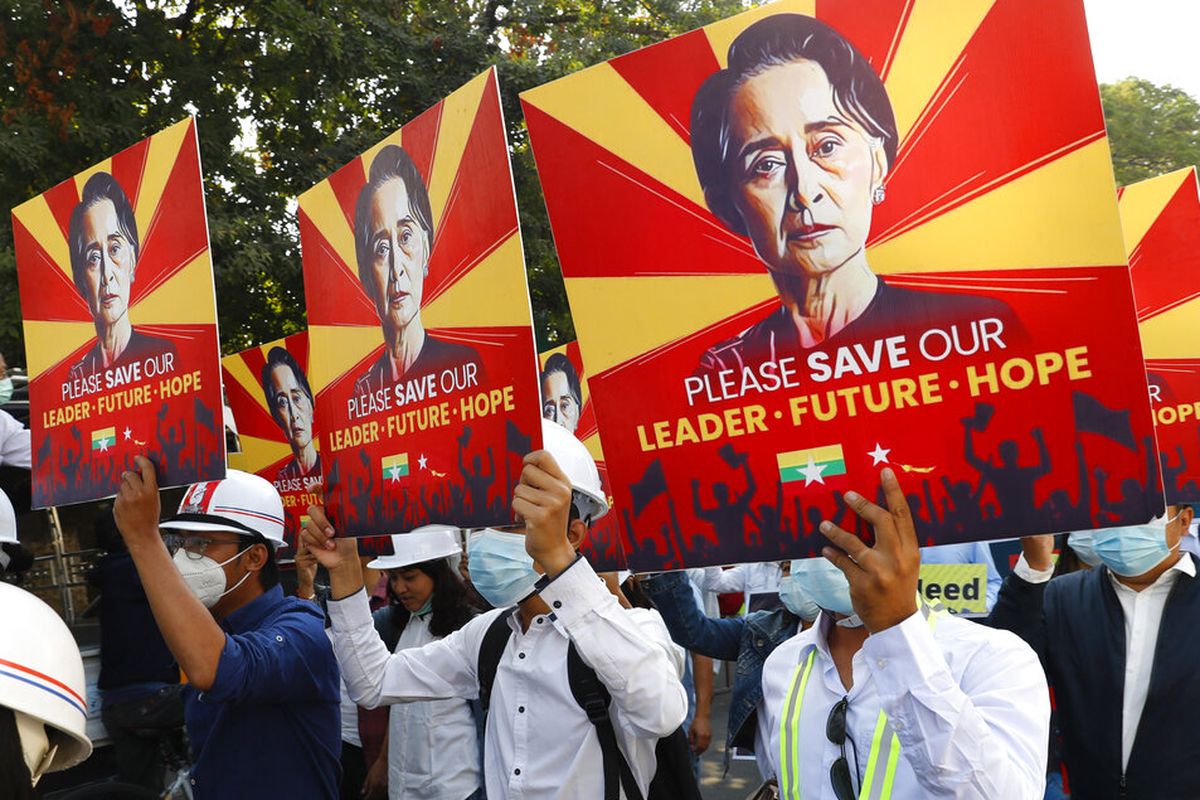 Engineers hold posters with an image of deposed Myanmar leader Aung San Suu Kyi as they hold an anti-coup protest march in Mandalay, Myanmar Monday, February 15, 2021. Myanmar's military leaders extended their detention of Suu Kyi, whose remand was set to expire on Monday, as protests continued to roil the Southeast Asian country following a military coup earlier this month. (AP Photo)