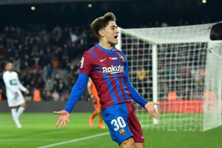 Pablo Gavi merayakan gol yang ia cetak dalam pertandingan Barcelona vs Elche di Stadion Camp Nou, 18 Desember 2021. Pada laga pekan ke-18 Liga Spanyol 2021-2022 ini, Gavi mencetak satu gol dan satu assist.