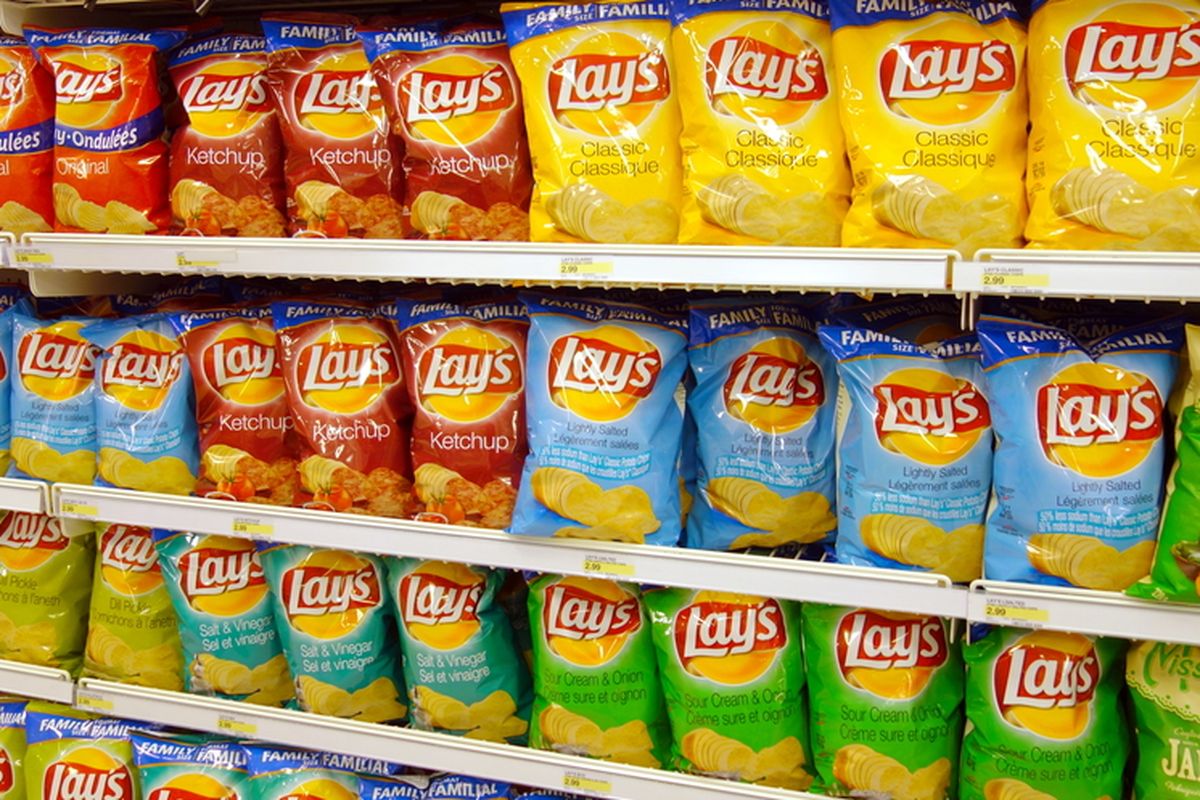 A row of Lay's potato chips at a supermarket