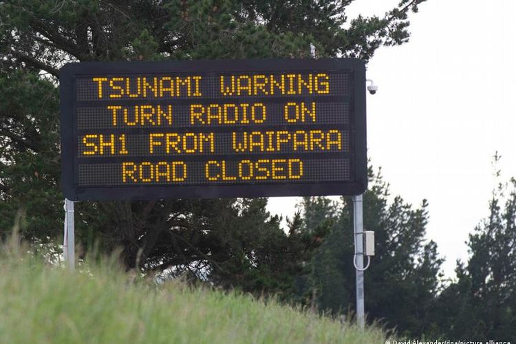 A road warning sign at Waipara, New Zealand following a series of earthquakes triggered a tsunami warning