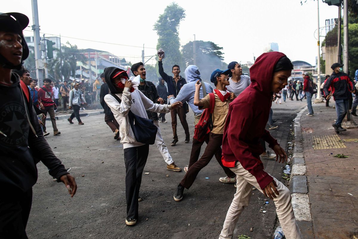 Pelajar melakukan Aksi Tolak RUKHP di Belakang Gedung DPR/MPR, Palmerah, Jakarta Barat, Rabu (25/9/2019).