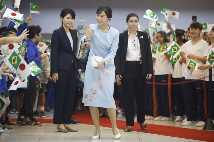 Japan's Princess Kako of Akishino waves to children during a visit at the Brazilian Society of Japanese Culture and Social Assistance (Bunkyo) in Sao Paulo, Brazil on June 06, 2025. (Photo by Miguel SCHINCARIOL / AFP)