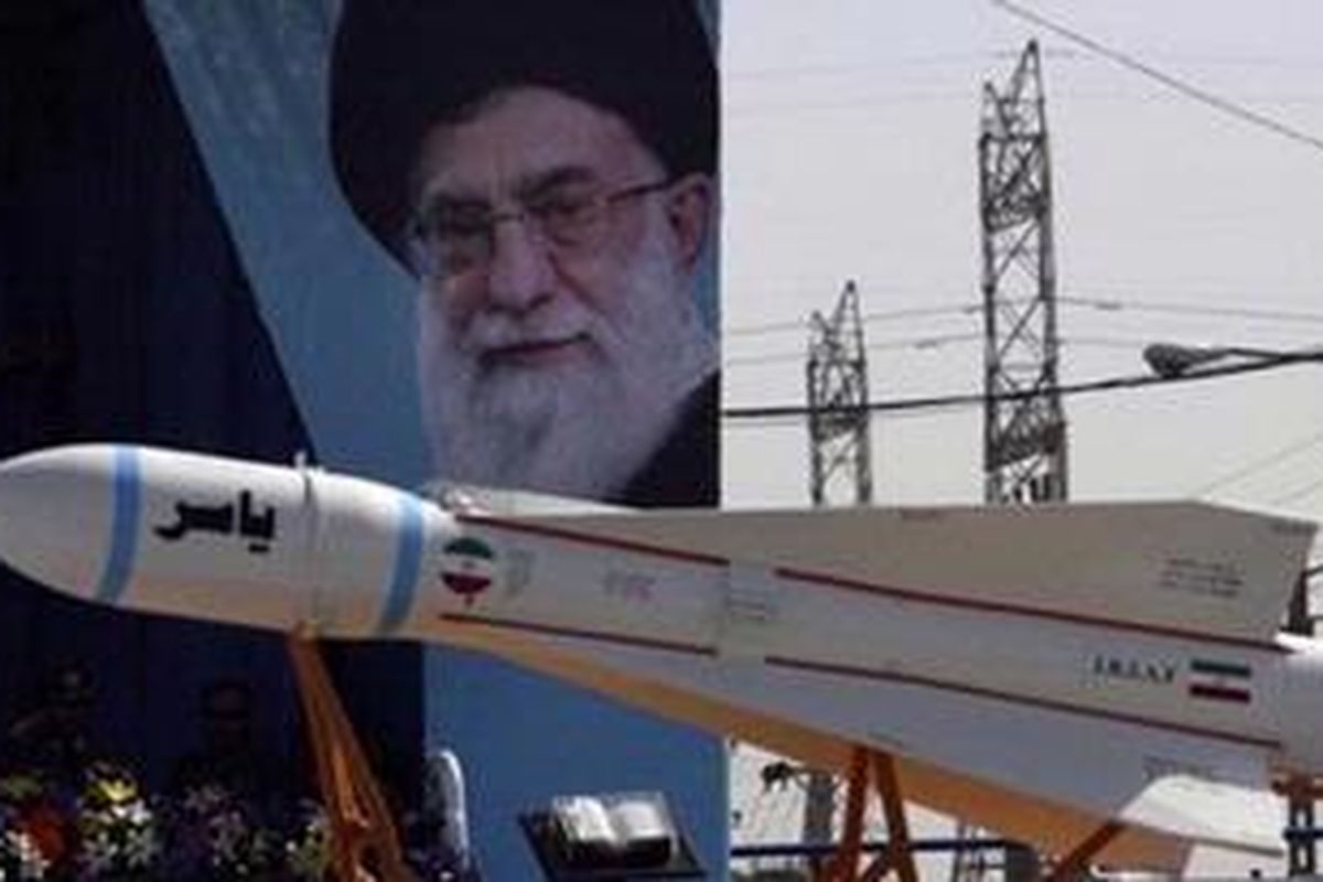 A Yasser missile is displayed during Iranian army parade, marking national Army Day, in front of the mausoleum of the late revolutionary founder Ayatollah Khomeini near Tehran, Iran, Monday, April 18, 2011. A portrait of the Iranian supreme leader Ayatollah Ali Khamenei is seen at rear.