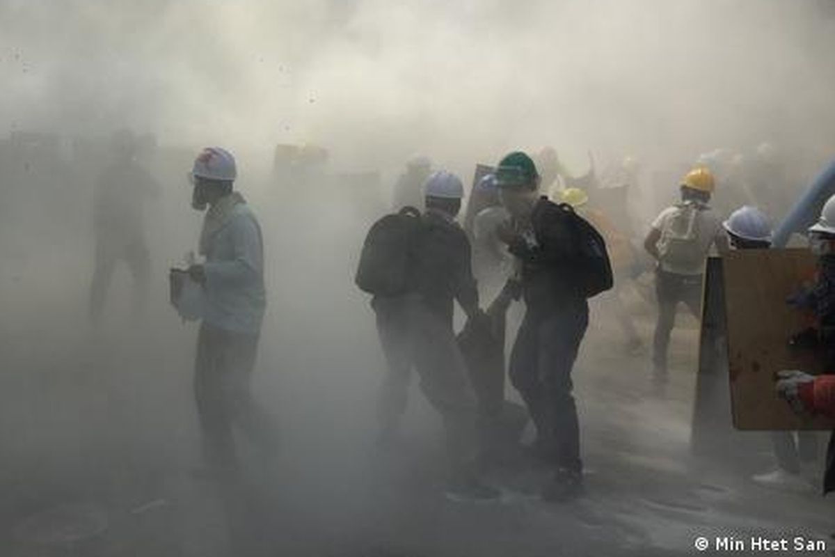 A clash between protesters and security forces in Yangon, Myanmar