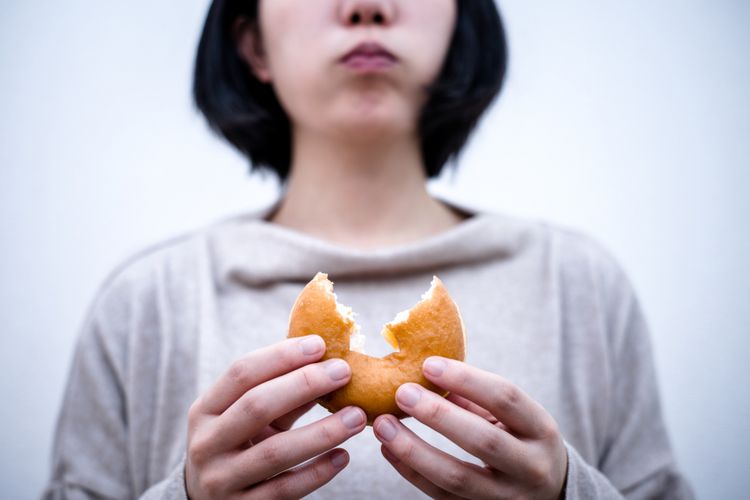 Ilustrasi makan donat