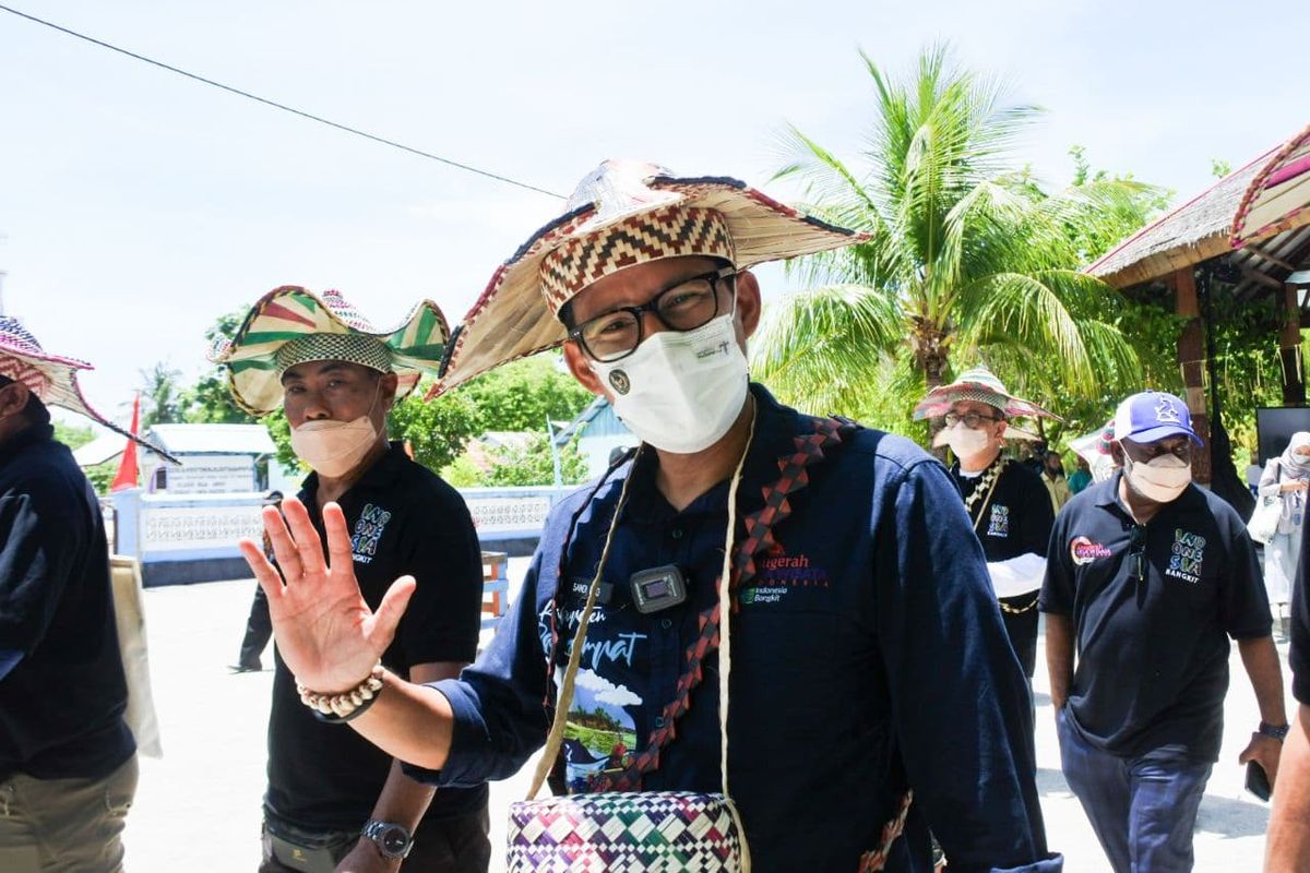 Tourism and Creative Economy Minister Sandiaga Salahuddin Uno gestures during his visit to the Arborek Tourism Village in West Papua on Wednesday, Oct. 27, 2021. 