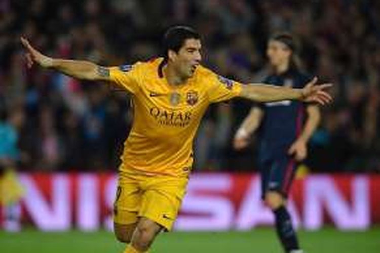 Luis Suarez merayakan gol Barcelona ke gawang Atletico Madrid saat kedua tim berhadapan di Camp Nou, Selasa (5/4/2016).