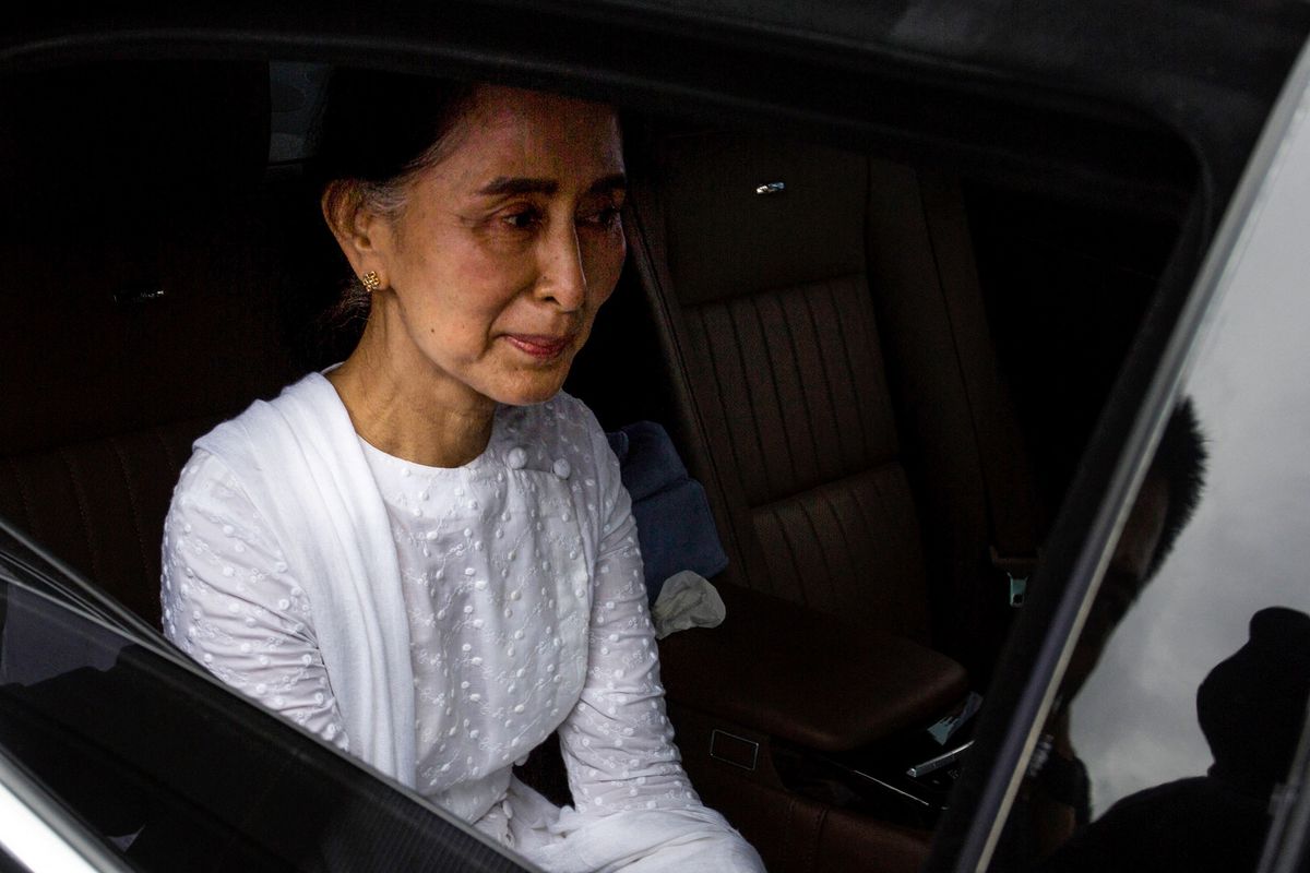 (FILES) In this file photo taken on August 17, 2017, Myanmar's Aung San Suu Kyi leaves after attending the funeral service for the National League for Democracy (NLD) party's former chairman Aung Shwe in Yangon. (Photo by AFP)