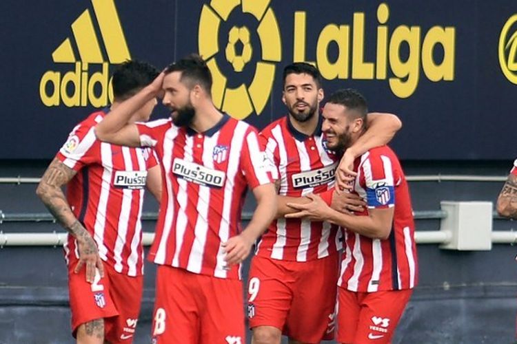 Luis Suarez dan pemain Atletico Madrid merayakan gol mereka ke gawang Cadiz CF pada laga lanjutan Liga Spanyol jornada 21, Minggu (31/1/2021) malam WIB.