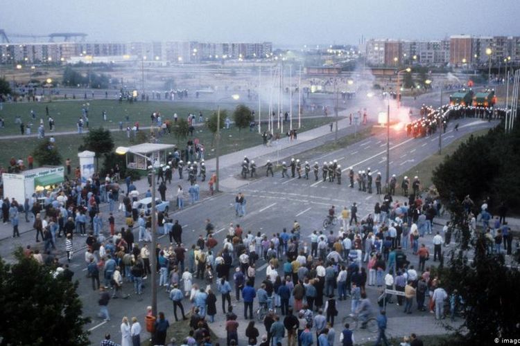 Police in Rostock-Lichtenhagen deploy counter measures against neo-Nazis during violent riots in 1992