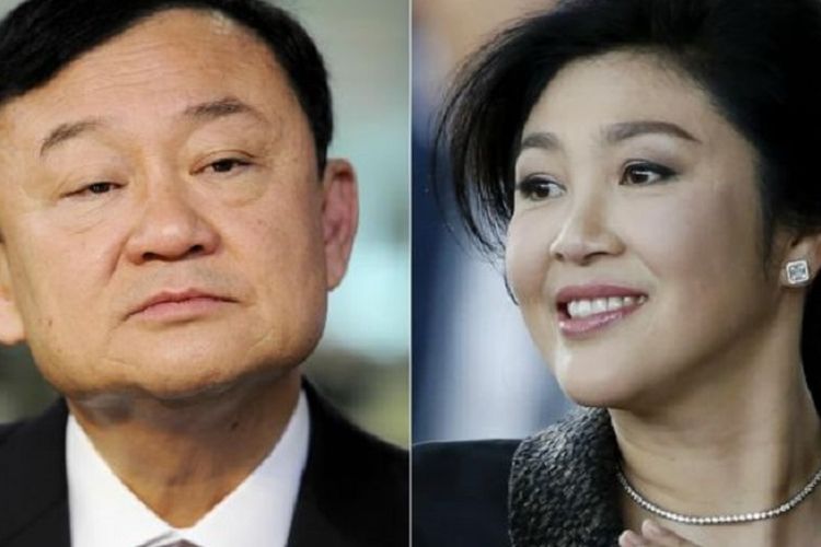 Mantan Perdana Menteri Thailand Thaksin Shinawatra (kiri) dan Yingluck Shinawatra