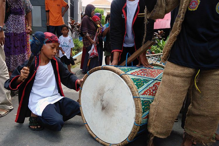 Muhammad Arfan Maulana semangat bisa menjadi bagian anggota tetabuhan di acara pencak macan.