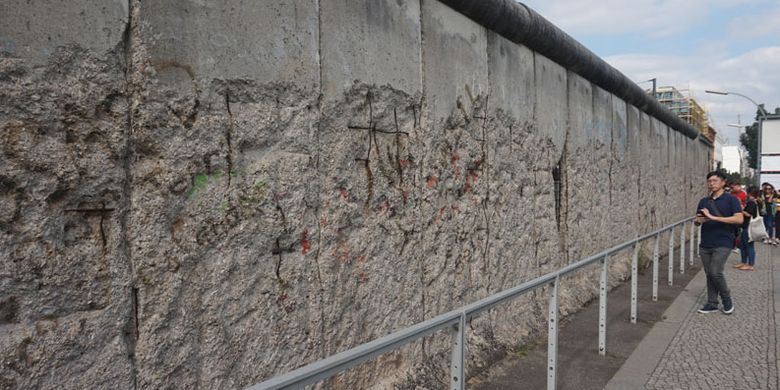 Tembok Berlin, Rabu (20/6/2018), merupakan salah satu destinasi wisata yang wajib didatangi turis di kota Berlin, Jerman.