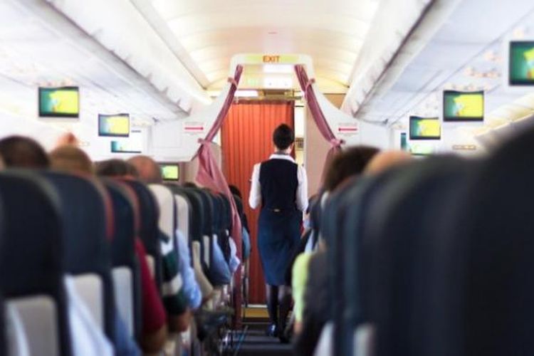 Ilustrasi kabin penumpang di pesawat terbang.