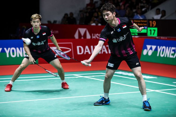 Pasangan ganda putra Indonesia, Marcus Fernaldi Gideon/Kevin Sanjaya Sukamuljo melawan wakil Malaysia, Aaron Chia/Soh Wooi Yik saat pertandingan babak semi final Indonesia Masters 2020 di Istora Senayan, Jakarta, Sabtu (18/1/2020). Marcus/Kevin menang dua gim langsung atas Aaron/Soh dengan skor 21-19, 21-19 dalam tempo 33 menit.