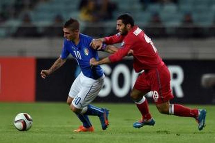 Marco Verratti saat membela Italia melawan Azerbaijan, Sabtu (10/10/2015). 