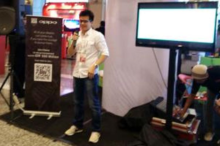 Ivan Lau, Brand Director Oppo Indonesia membeberkan kompetisi startup Oppo di ajang Startup Asia Jakarta, Rabu (26/11/2014).