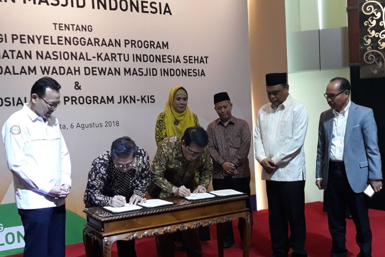 Penandatangan Nota Kesepahaman antara BPJS Kesehatan dan Dewan Masjid Indonesia (DMI) di Kantor Pusat BPJS Kesehatan, Senin (6/8/2018)