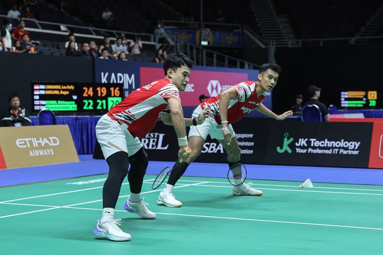 Aksi Leo Rolly Carnando/Bagas Maulana kala bertanding di babak 32 besar Singapore Open 2025 pada Selasa (27/5/2025) di Singapore Indoor Stadium. Terkini, mereka akan tampil di Hylo Open 2025.