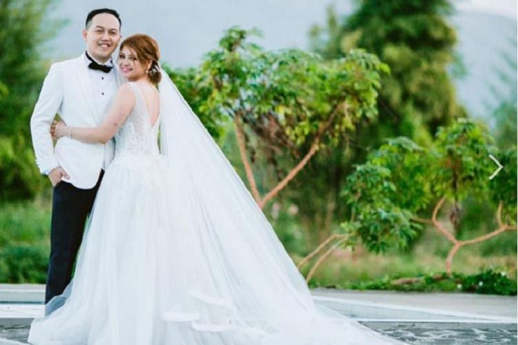 Pasangan pengantin baru  Erika Joyce dan Leomer Lagradilla. 