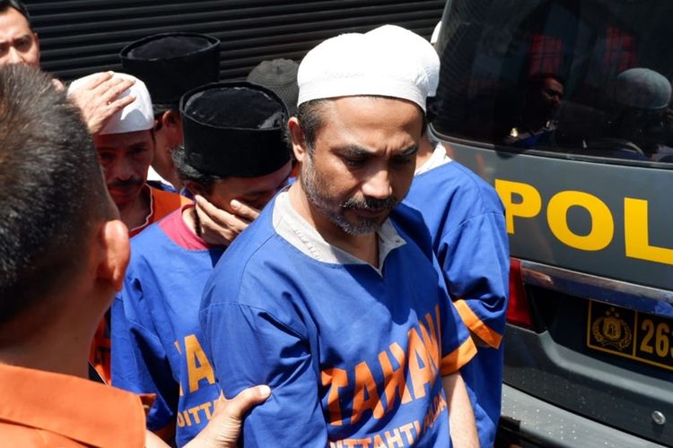 Para tersangka penyerangan markas Polsek Tambelangan dilimpahkan ke Kejari Surabaya, Kamis (22/8/2019)