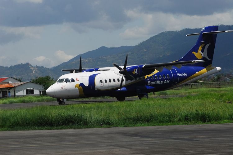 Ilustrasi pesawat - Maskapai penerbangan Buddha Air.