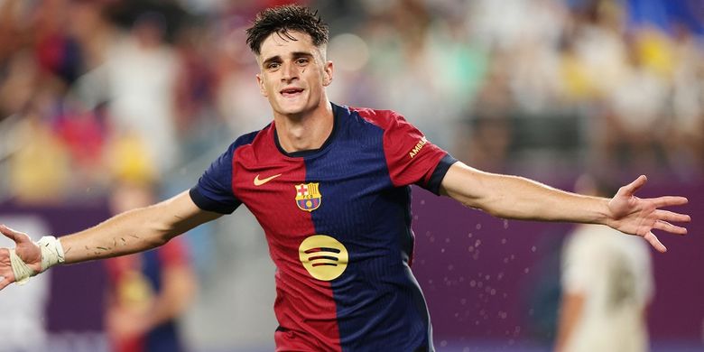 Mantan penyerang Barcelona Pau Victor merayakan golnya dalam pertandingan persahabatan klub pramusim antara Real Madrid vs Barcelona di Stadion MetLife di East Rutherford, New Jersey, 3 Agustus 2024. (Foto oleh Charly TRIBALLEAU / AFP)