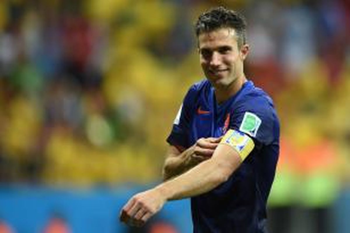 Ekspresi penyerang Belanda, Robin van Persie, usai timnya meraih kemenangan 3-0 atas Brasil, pada pertandingan perebutan tempat ketiga Piala Dunia antara timnya dan Brasil, di Estadio Nacional, Brasilia, Sabtu (12/7/2014).
