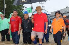 Bercelana Pendek, Olly Temui Korban Banjir Manado