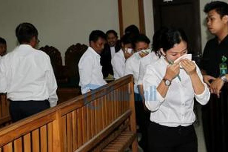 Sebanyak 14 PNS Dispenda Gianyar menjadi terdakwa dugaan kasus korupsi perjalanan dinas fiktif tahun 2012 silam di Pengadilan Negeri Denpasar, Rabu (18/11/2015) 
