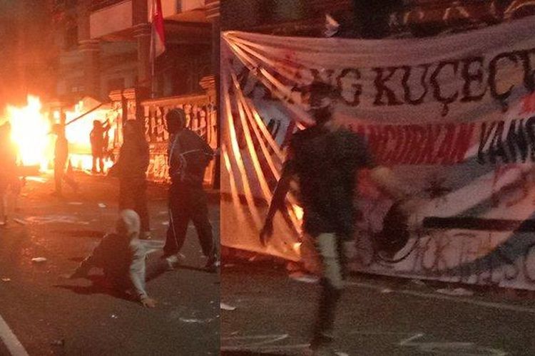 Pos gedung DPRD Kota Malang yang dibakar oleh massa aksi penolakan UU TNI saat dipadamkan oleh mobil water canon Polresta Malang Kota, Minggu (23/3/2025). 