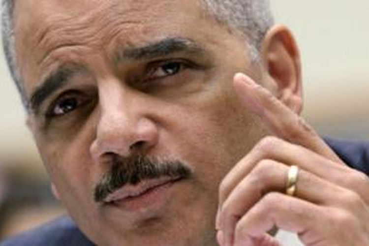 Jaksa Agung Eric Holder mengatakan dakwaan itu adalah yang pertama terkait kejahatan internet.