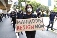 Berpakaian Hitam-hitam, Ratusan Pemuda Malaysia Turun ke Jalan Tuntut PM Muhyiddin Mundur