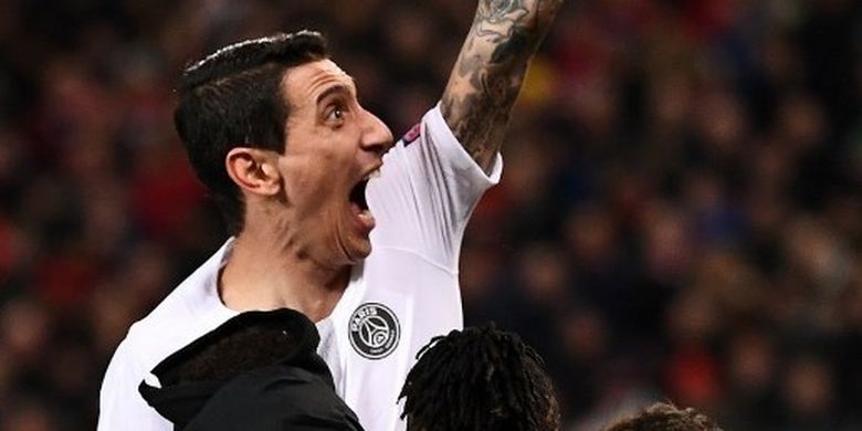 Angel Di Maria saat merayakan kemenangan PSG di Stadion Old Trafford, markas Manchester United, 12 Februari 2019.