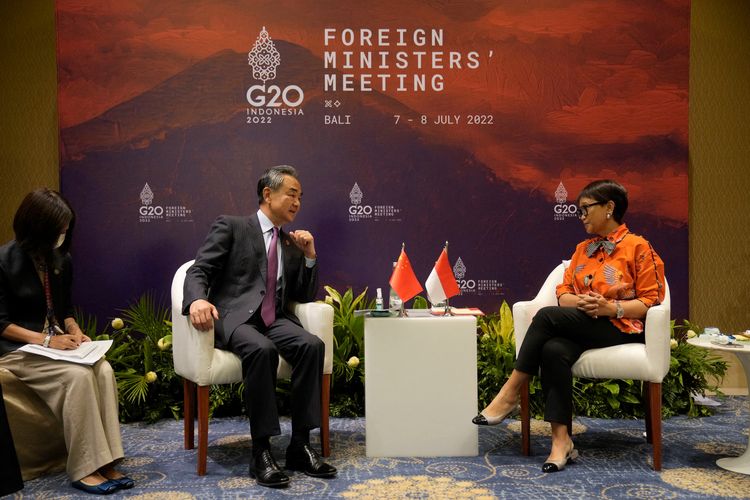 Indonesian Foreign Minister Retno Marsudi (R) and Chinese Foreign Minister Wang Yi (L) hold a bilateral meeting ahead of the G20 Foreign Ministers' Meeting in Nusa Dua on July 7, 2022. DITA ALANGKARA / POOL / AFP