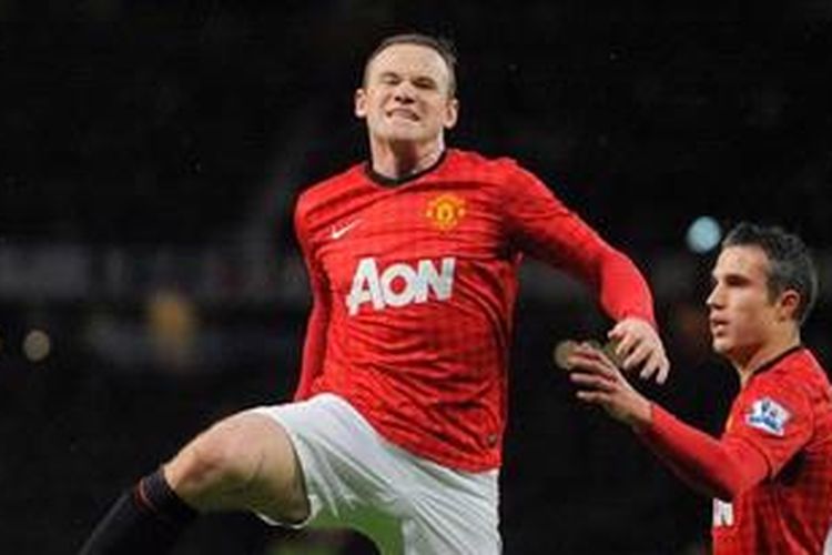 Penyerang Manchester United, Wayne Rooney (kiri). 