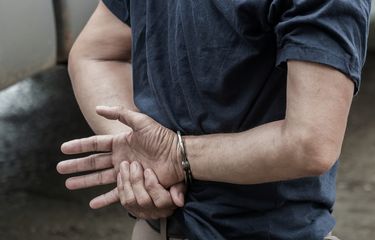 Ilustrasi tersangka ditahan.