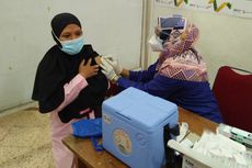 Momen Ibu Hamil Semringah Ikut Vaksinasi yang Digelar Kompas Gramedia di Gresik