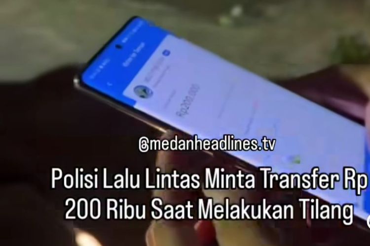 Aksi personel Unit Lantas Polsek Medan Baru, Bripka HS, yang meminta uang denda tilang Rp 200 ke warga viral di media sosial. 
