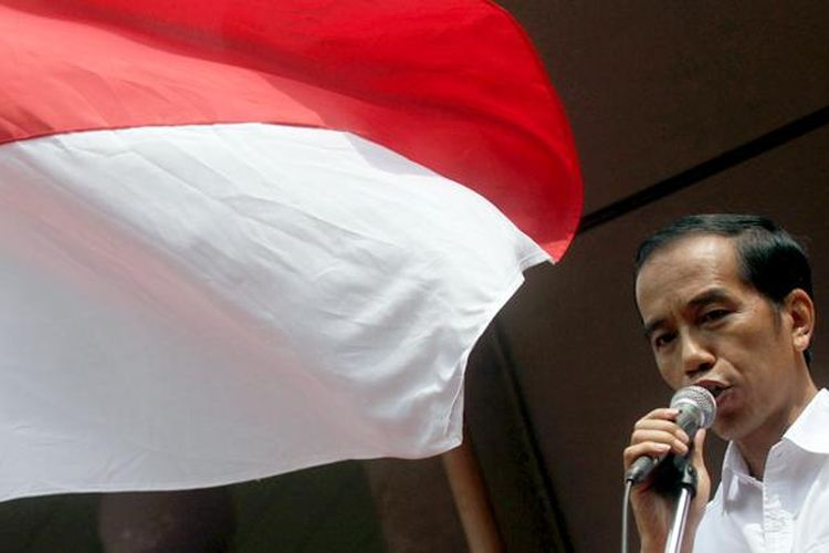 Bakal calon presiden Joko Widodo (Jokowi) saat acara deklarasi dirinya yang akan berpasangan dengan Jusuf Kalla sebagai bakal calon wakil presiden di Gedung Joang 45, Jalan Menteng Raya, Menteng, Jakarta Pusat, Senin (19/5/2014). Pasangan itu diusung empat partai, yaitu PDI Perjuangan, NasDem, PKB, dan Hanura. 