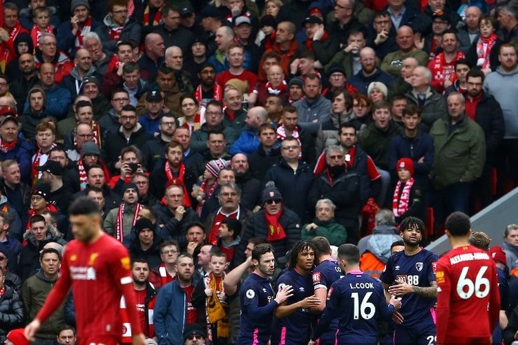 Para pemain Bournemouth merayakan gol ke gawang Liverpool pada laga Liga Inggris di Stadion Anfield, Sabtu (7/3/2020).