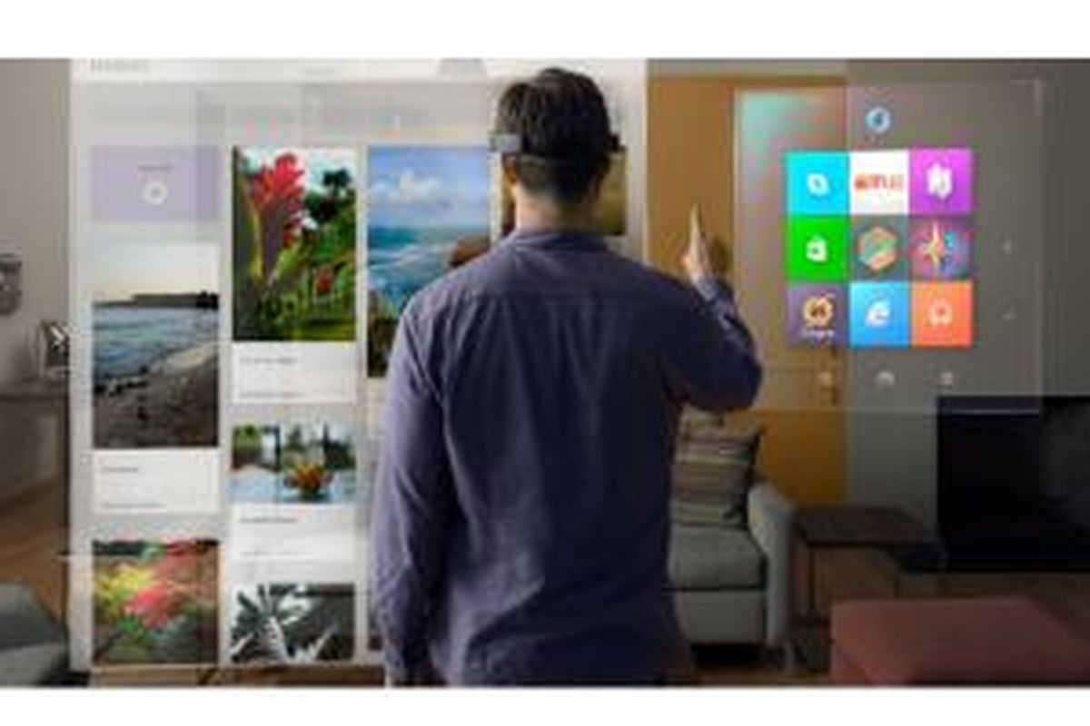 Pengguna HoloLens melihat tampilan komputer dengan lensa hologram 