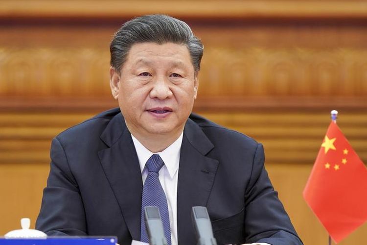 Presiden China Xi Jinping saat menghadiri G20 Extraordinary Virtual Leaders' Summit terkait persoalan Covid-19. Pertemuan ini dilakukan dengan cara video conference, dan Xi melakukannya dari ibu kota China, Beijing, pada 26 Maret 2020.