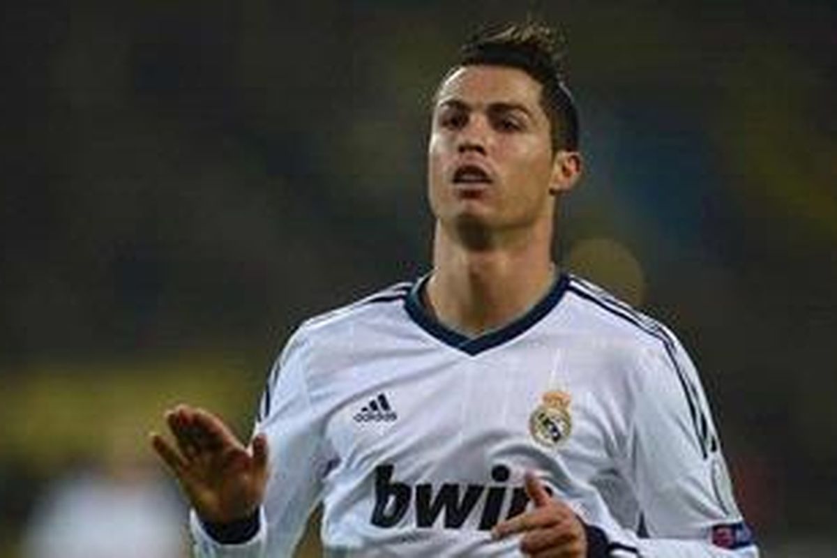 Ekspresi gelandang Real Madrid, Cristiano Ronaldo, setelah membobol gawang Borussia Dortmund, pada pertandingan ketiga Grup D, di Signal Iduna Park, Rabu (24/10/2012).